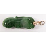 A nephrite jade pendant carved with peaches, 3.5cm long