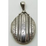 Victorian silver locket with raised decoration