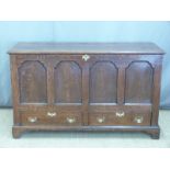 Oak panelled mule chest with panelled front, two drawers below and pegged joints, L142 x D54 x H85cm