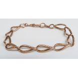 A 9ct rose gold bracelet made from a Victorian fob chain 16.4g