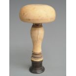A large intaglio desk seal in the form of a mushroom, with white metal mount and screw-off top