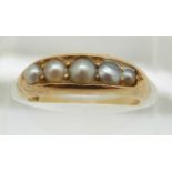 Victorian 18ct gold ring set with five graduated pearls, 4.7g