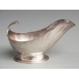 Art Deco hallmarked silver sauce boat with stylised handle, London 1936 maker Charles Boyton & Son