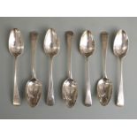 Seven Georgian hallmarked silver Old English pattern dessert spoons, length 17cm, five being