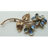 Victorian rose gold brooch set with moonstone cabochons in the form of a flower, 7 x 4cm