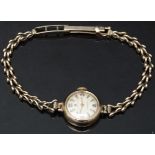 Cyma Cymaflex 9ct gold ladies wristwatch with gold hands and hour markers, silver dial and signed 17