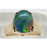 A 9ct gold ring set with an opal triplet, 3.2g, size N