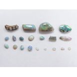 Three opal cabochons and a moonstone cabochon