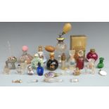 Collection of scent bottles and atomizers including a yellow guilloche' enamel example marked