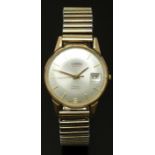 Roamer Premier 9ct gold gentleman's wristwatch with date aperture, gold hands and hour markers,