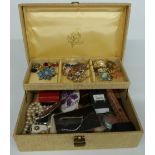 A collection of costume jewellery including Sarah Coventry, silver pendants, brooches etc