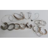 Five hallmarked silver and white metal bangles and bracelets, five further bracelets, four silver