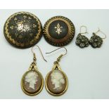 Two Victorian tortoiseshell brooches inlaid with gold, similar earrings and a pair of Victorian