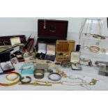 A collection of costume jewellery including vintage earrings, abalone bracelet, necklaces,