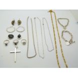 Two silver bracelets, a Monet necklace, two silver necklaces, a silver cross, three silver rings etc