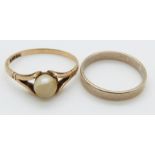 A 9ct gold ring and a 9ct gold wedding band, 3g