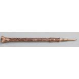 Yellow metal propelling pencil with hardstone finial, marked E.B 9ct, length when extended 13.5cm,