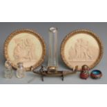 A pair of classical style pottery wall plaques, diameter 17.5cm, cloisonne' ware, silver topped