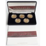 Cased set of five Royal Mint gold plated silver proof crown sized coins commemorating the History of