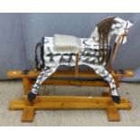 A child's rocking horse, W110 x H67cm