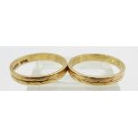 A pair of 18ct gold rings with foliate decoration, 4.7g, both size M