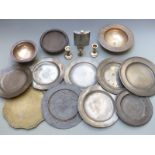 Quantity of 18th and 19thC pewter plates, most with touch marks and one impressed Harvey, largest