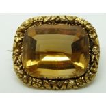 Victorian brooch set with a large mixed cushion cut citrine, in antique jewellery box, 3.5 x 3cm