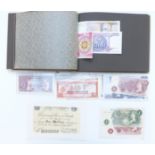 An album containing various UK and overseas banknotes, includes some novelty and replica examples,