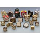 A large collection of alarm clocks etc to include novelty examples, travel alarms, Estyma, Westclox,