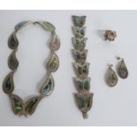 A suite of Mexican silver jewellery set with abalone comprising necklace, bracelet and earrings