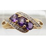 A 9ct gold ring set with amethysts and diamonds, 2.4g, size P