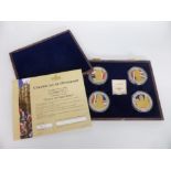 Windsor Mint cased set of four "Year of the Three Kings" proof coins, each coin silver plate with