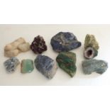 Ten various mineral samples including an amethyst geode, quartz etc.