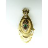 Victorian Etruscan Revival brooch/ pendant set with a foiled emerald surrounded by seed pearls in