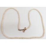 A single strand of natural pearls with diamond clasp, with Gem & Pearl Lab certificate