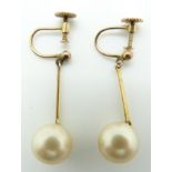 A pair of 9ct gold earrings set with faux pearls