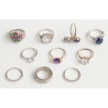 Ten rings including silverexample set with a round cut white sapphire, five silver rings set with