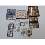 A small amateur collection of UK and overseas coins and commemoratives, includes very small silver