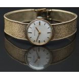 Marvin 9ct gold ladies wristwatch with gold hands, two-tone hour markers, silver dial and signed