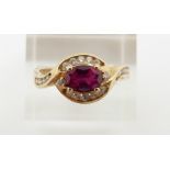 A 14ct gold ring set with synthetic ruby and cubic zirconia, 3.6g, size T
