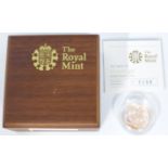 2009 gold full sovereign in Royal Mint deluxe case, proof edition with certificate.