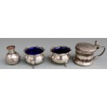 Pair of George V Walker and Hall hallmarked silver salts with blue glass liners, Sheffield 1913