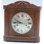 Wurttemberg oak cased mantel clock with reeded decoration to case, Kemp Brothers, Union St.
