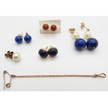 Two pairs of 9ct gold earrings set with lapis lazuli, a pair of earrings set with lapis lazuli and a