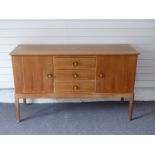 Gordon Russell of Broadway sideboard with three drawers flanked by two cupboards, W142 x D39 X