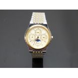 Rotary triple calendar gentleman's wristwatch with inset day and date dials, moonphase, gold Roman