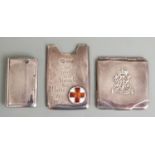 Three early 20th century hallmarked silver cases comrpising card slip case with enamel red cross and