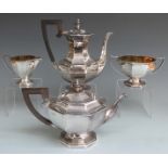 Walker and Hall George V hallmarked silver octagonal four piece teaset, the sugar bowl and milk