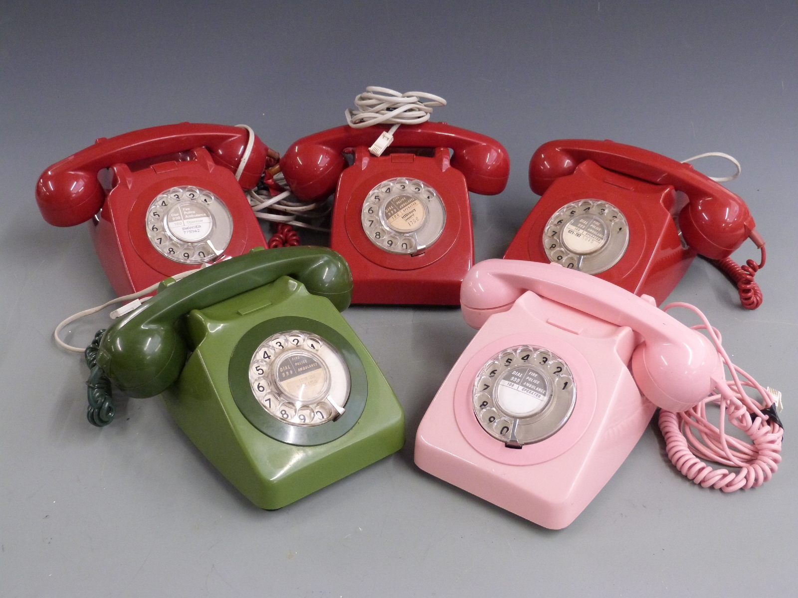 Five retro coloured telephones