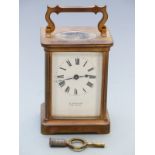 20thC French brass carriage clock. A Jack & Co., Cheltenham  to enamelled Roman dial, blued steel